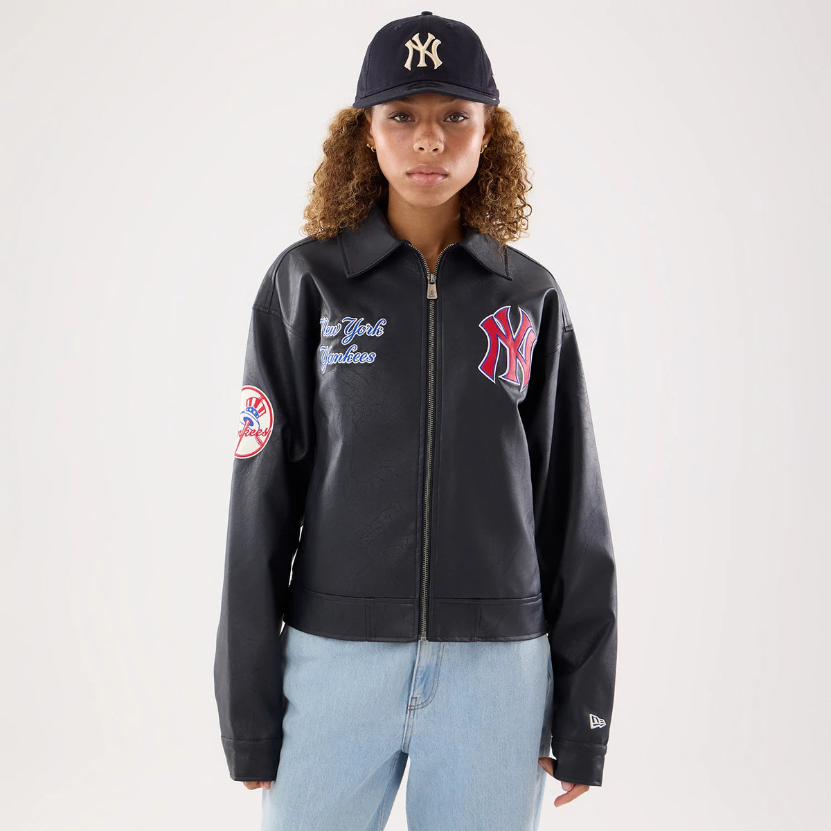 The model is wearing this Womens MLB New York Yankees Collared Jacket in black. 1