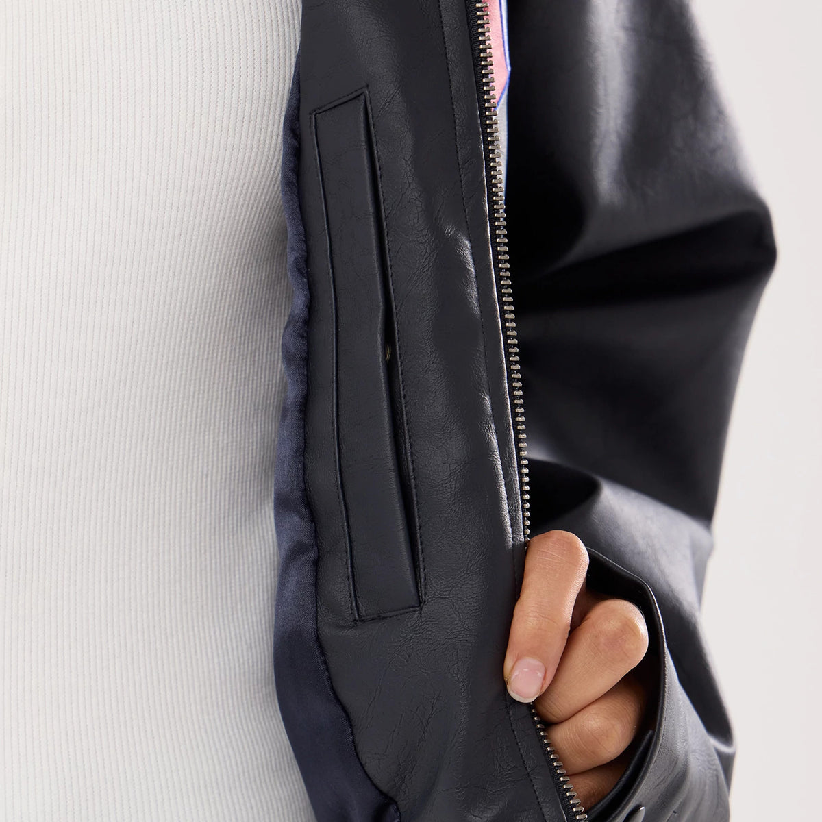 The model is wearing this Womens MLB New York Yankees Collared Jacket in black. 4