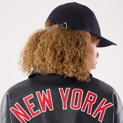 The model is wearing this Womens MLB New York Yankees Collared Jacket in navy. 7