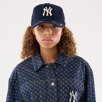 The model is wearing this Womens MLB Denim New York Yankees Jacket in navy. 7