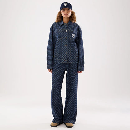 New Era New York Yankees Womens MLB Denim Navy Jacket, front view on a model styled with matching trousers and cap, displaying a patterned denim style with a white embroidered Yankees logo on the chest and button-down front closure.