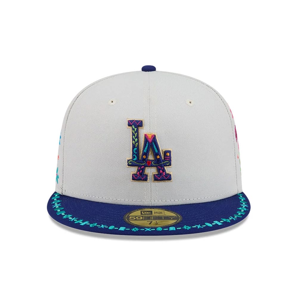 Pictured is this MLB Heritage LA Dodgers 59FIFTY Fitted cap in light beige. 4