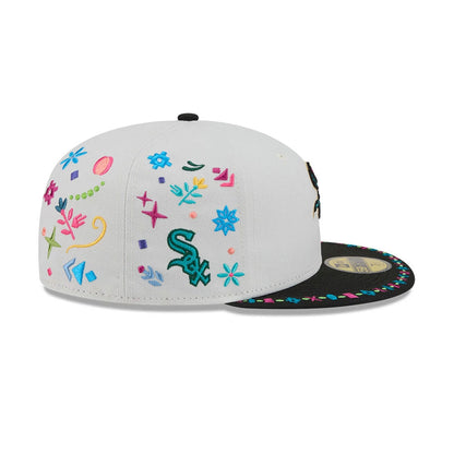 Chicago White Sox MLB Heritage Light Beige New Era 59FIFTY Fitted Cap, side view showing colourful embroidered graphics including stars and flowers, with a dark green Sox logo on the white side crown and a decorated black visor.