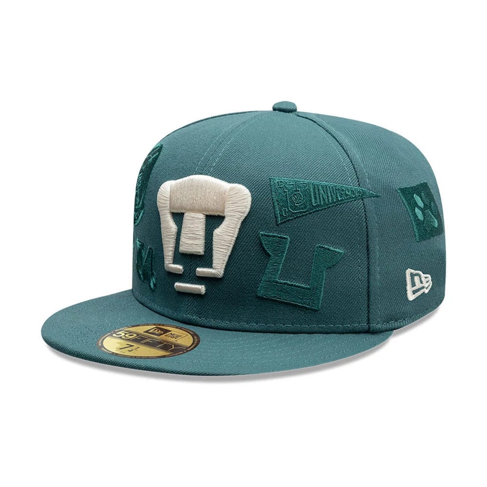 Pictured is this Liga MX All Over Pumas Unam 59FIFTY Fitted cap in dark green. 1