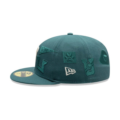 Pictured is this Liga MX All Over Pumas Unam 59FIFTY Fitted cap in dark green. 5
