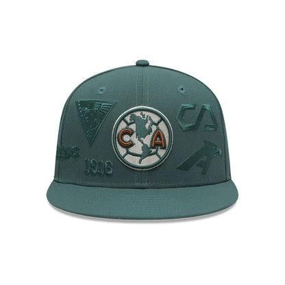 Pictured is this Liga MX All Over Club America 59FIFTY Fitted cap in dark green. 2