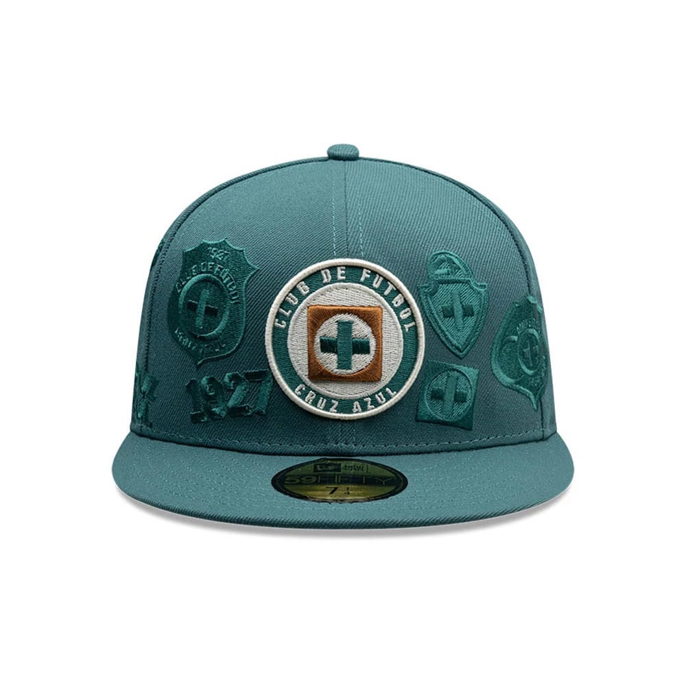 Pictured is this Liga MX All Over Cruz Azul 59FIFTY Fitted cap in dark green. 2