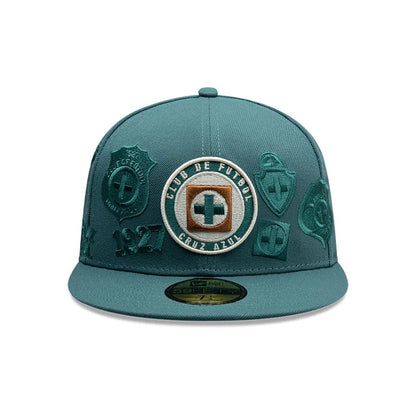 Pictured is this Liga MX All Over Cruz Azul 59FIFTY Fitted cap in dark green. 2