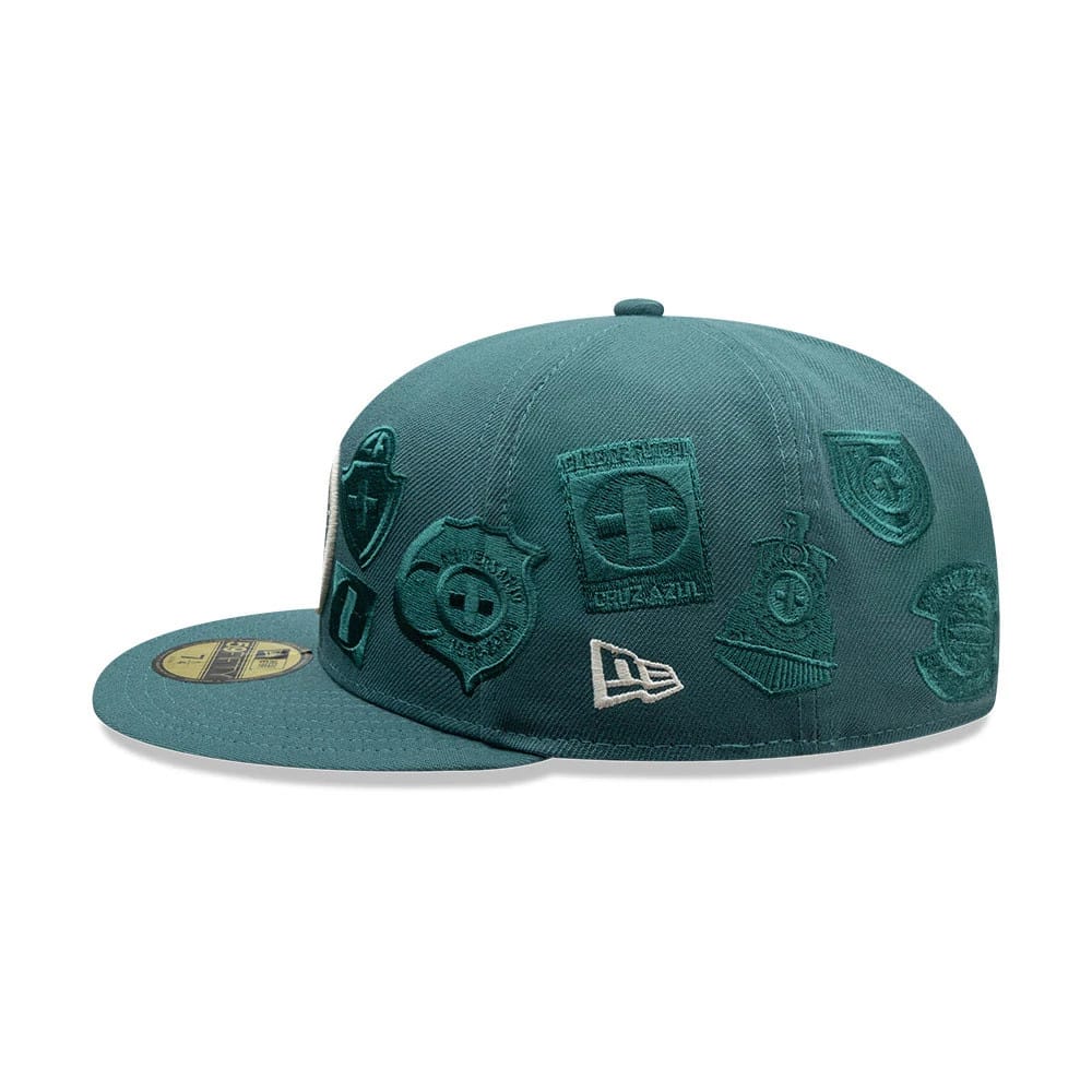 Pictured is this Liga MX All Over Cruz Azul 59FIFTY Fitted cap in dark green. 5