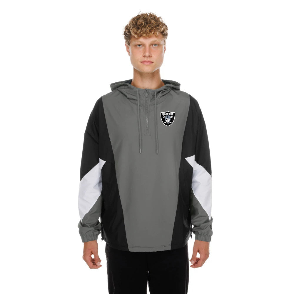 The model is wearing this NFL Las Vegas Raiders Windbreaker Jacket in grey. 1