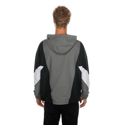 The model is wearing this NFL Las Vegas Raiders Windbreaker Jacket in grey. 2