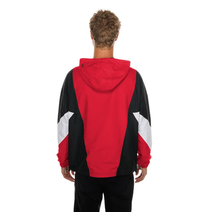 The model is wearing this NFL Kansas City Chiefs Windbreaker Jacket in red. 2
