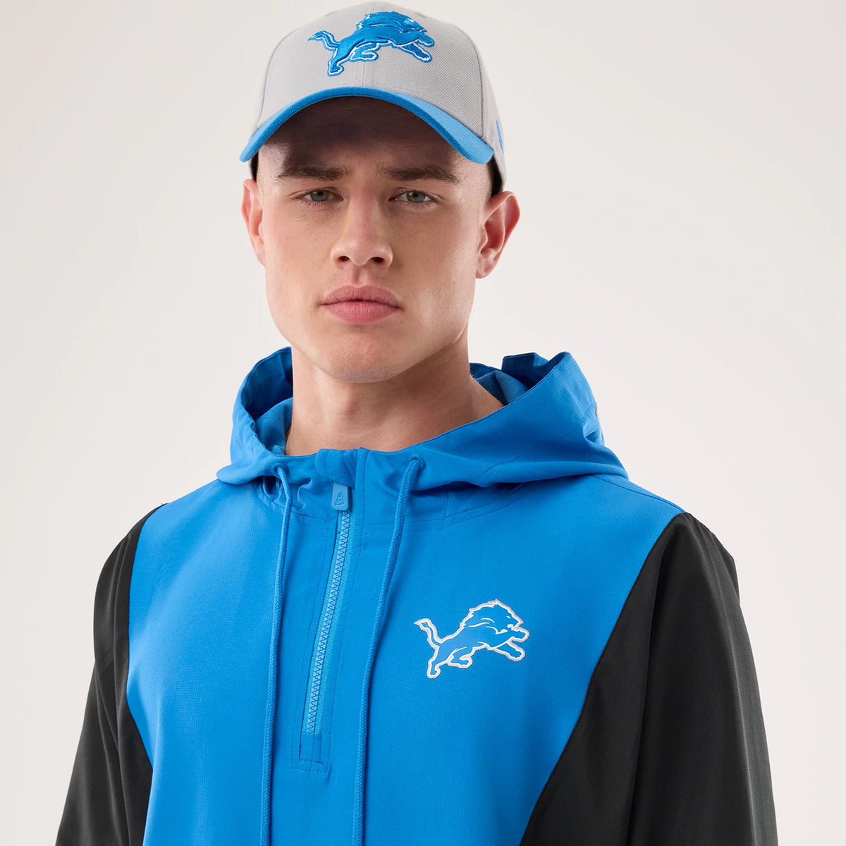 The model is wearing this NFL Detroit Lions Jacket in blue. 6