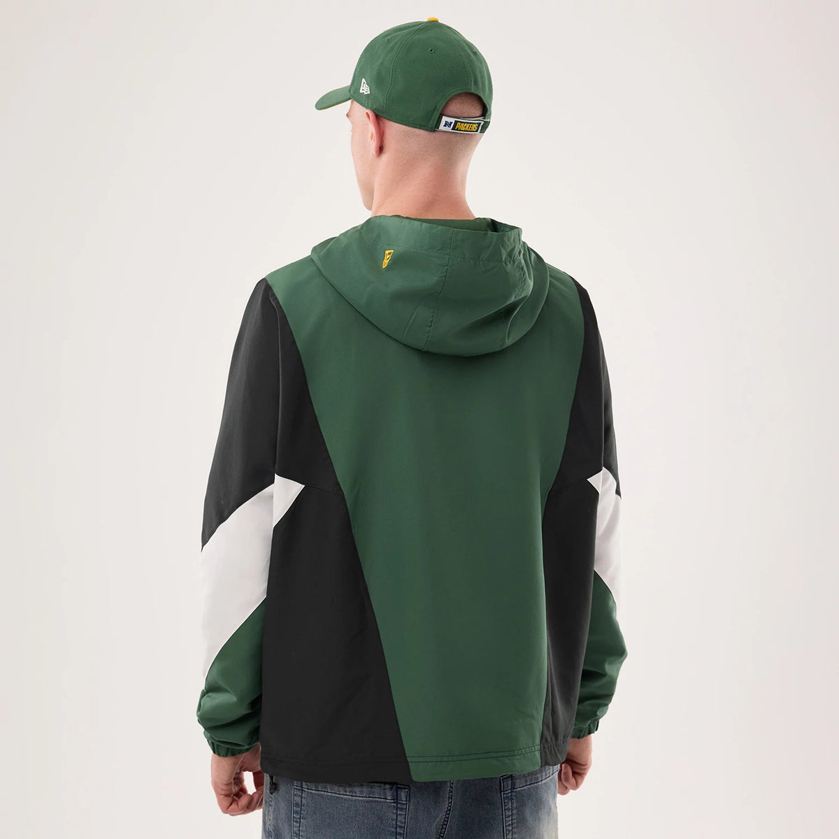 The model is wearing this NFL Green Bay Packers Jacket in dark green. 2
