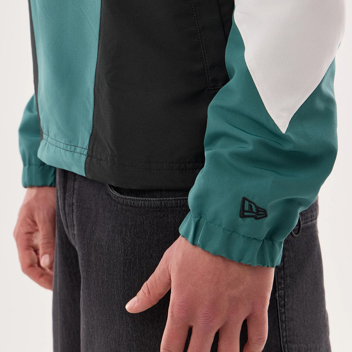 The model is wearing this NFL Philadelphia Eagles Jacket in dark green. 5