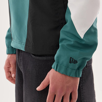 The model is wearing this NFL Philadelphia Eagles Jacket in dark green. 5