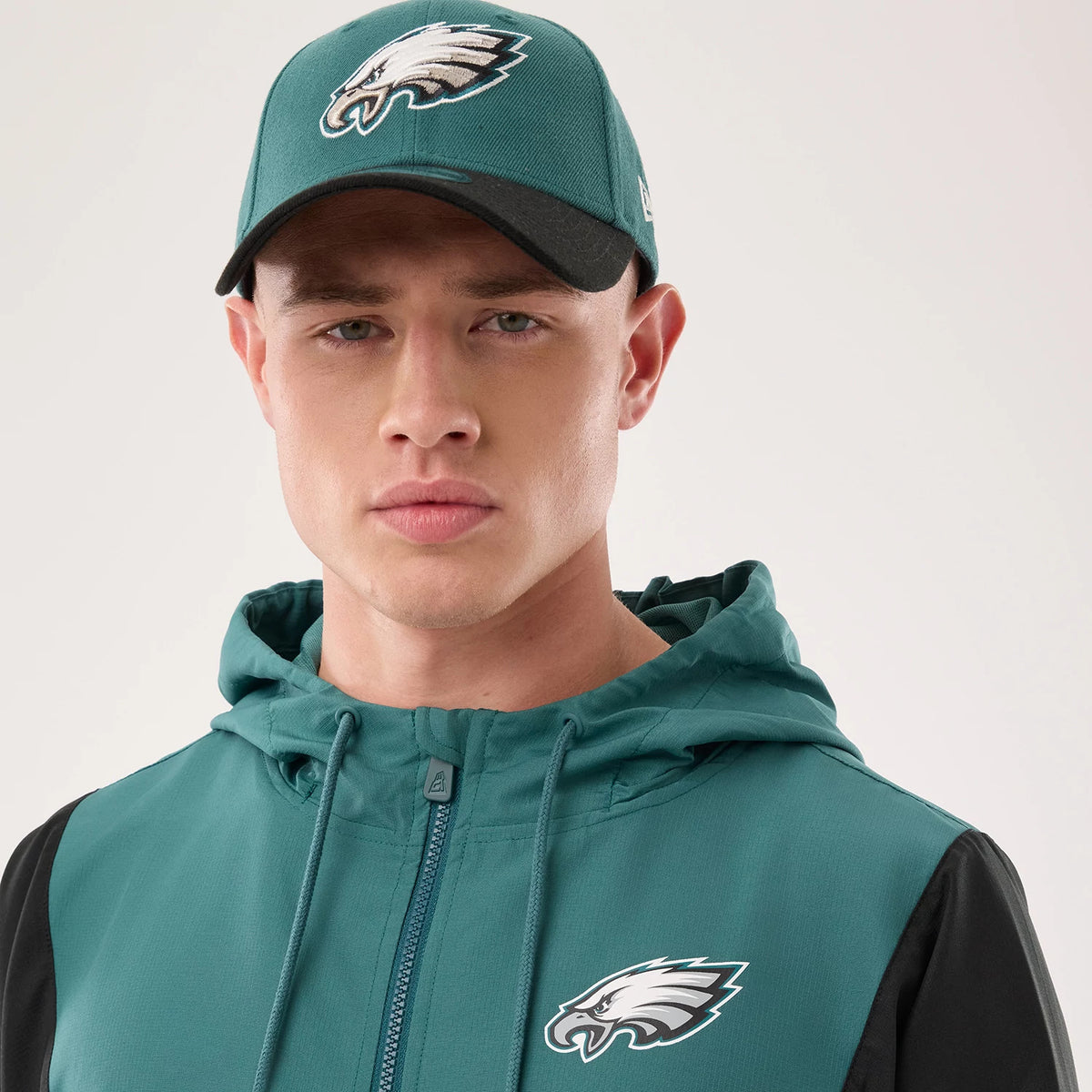 The model is wearing this NFL Philadelphia Eagles Jacket in dark green. 6