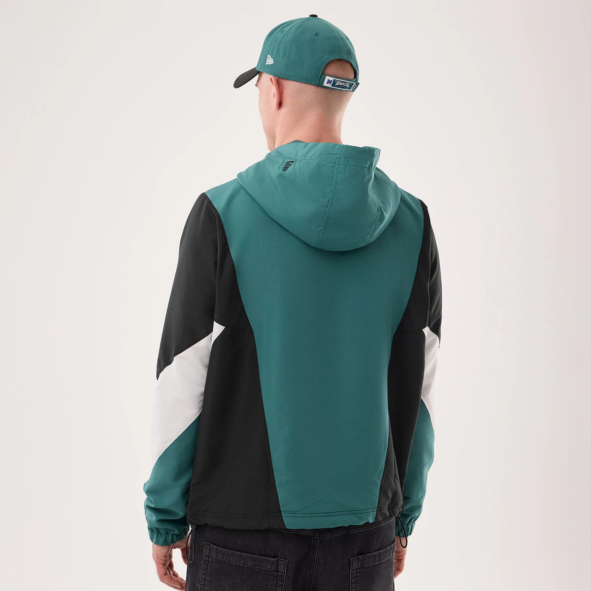 The model is wearing this NFL Philadelphia Eagles Jacket in dark green. 2