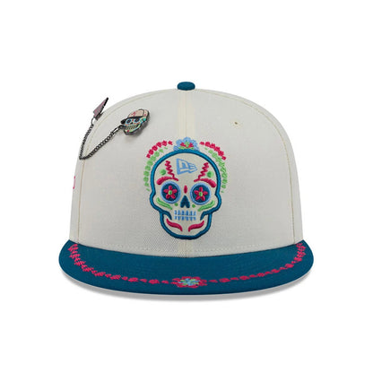 Pictured is this New Era Day Of The Dead 59FIFTY Fitted cap in light beige & blue. 3