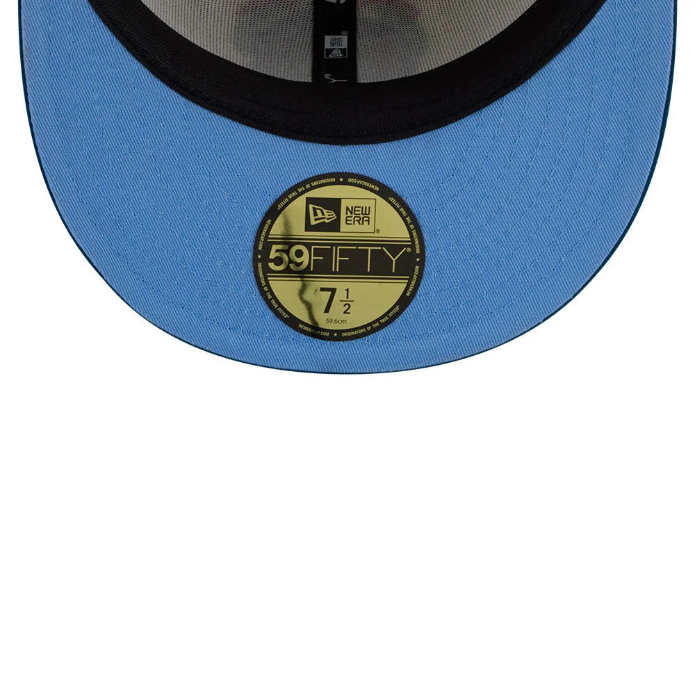 Pictured is this New Era Day Of The Dead 59FIFTY Fitted cap in light beige & blue. 2