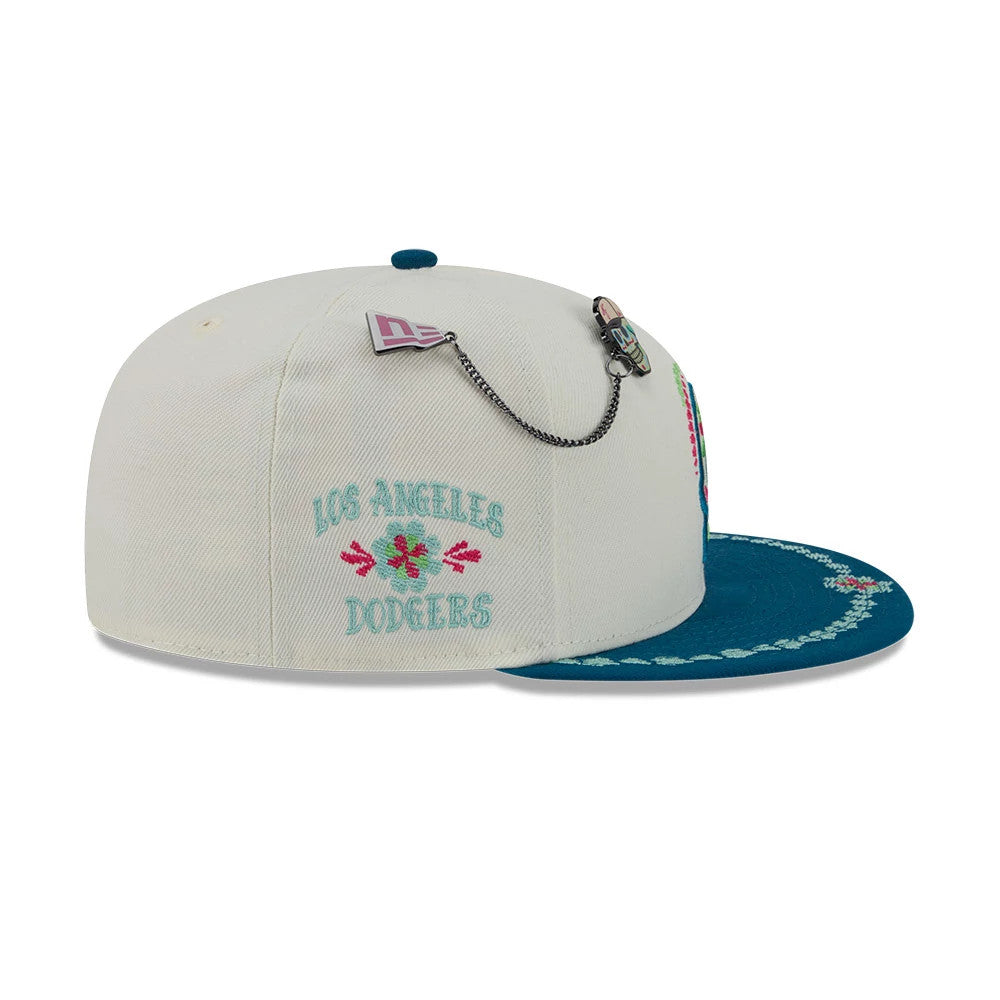 Pictured is this MLB Day Of The Dead LA Dodgers 59FIFTY Fitted cap in light beige & blue. 5