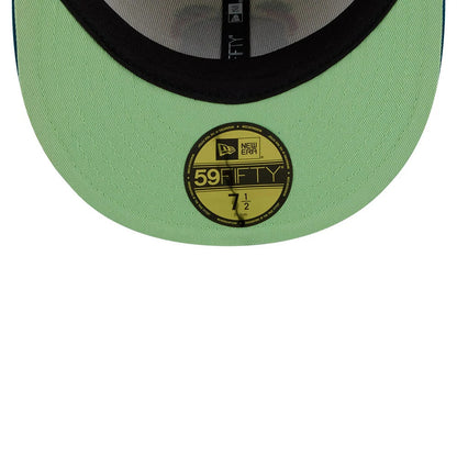 Pictured is this MLB Day Of The Dead LA Dodgers 59FIFTY Fitted cap in light beige & blue. 2
