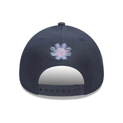 Yankees MLB Day Of The Dead Dark Blue New Era 9FORTY A-Frame Adjustable Cap, rear view showing a pink and light blue embroidered floral design on the dark blue crown above the adjustable snapback closure.