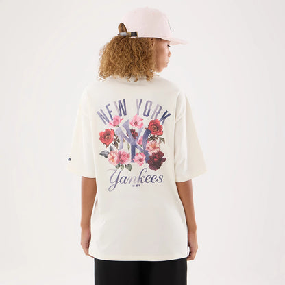The model is wearing this Womens MLB Graphic New York Yankees T-Shirt in open cream. 2
