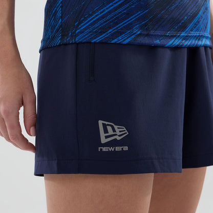 The model is wearing these Womens Atlassian Williams F1 Team Training Shorts in navy. 5