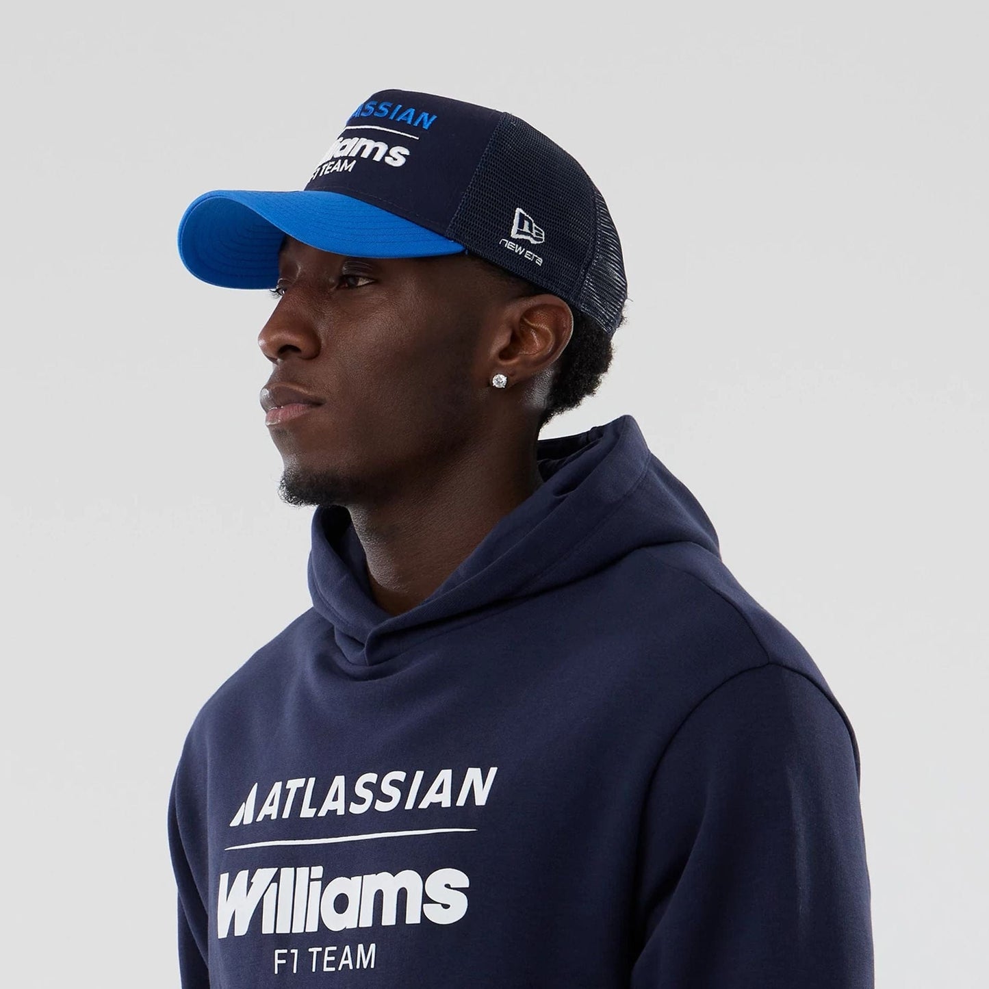 The model is wearing this Atlassian Williams F1 Team Oversized Pullover Hoodie in navy. 6