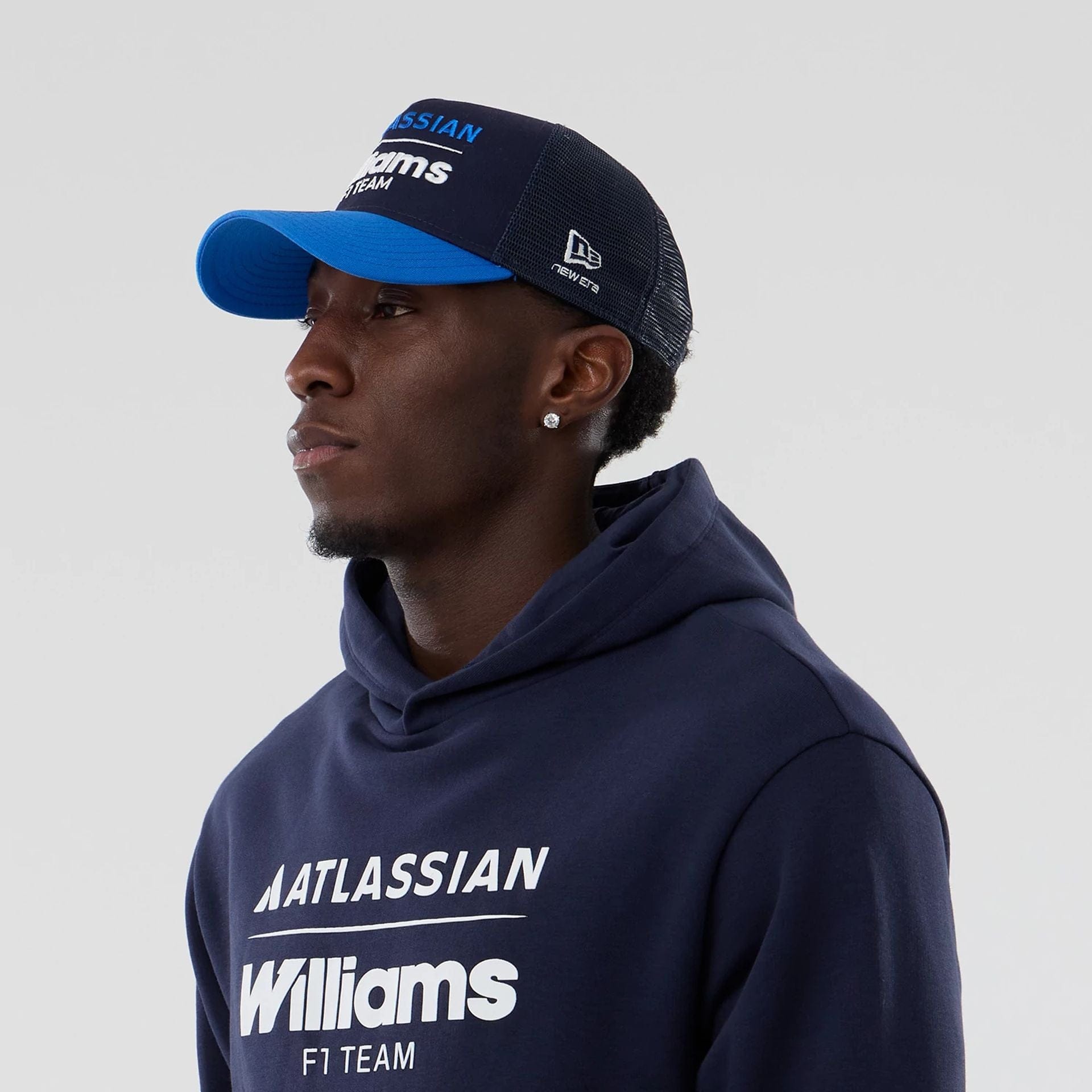 The model is wearing this Atlassian Williams F1 Team Oversized Pullover Hoodie in navy. 6