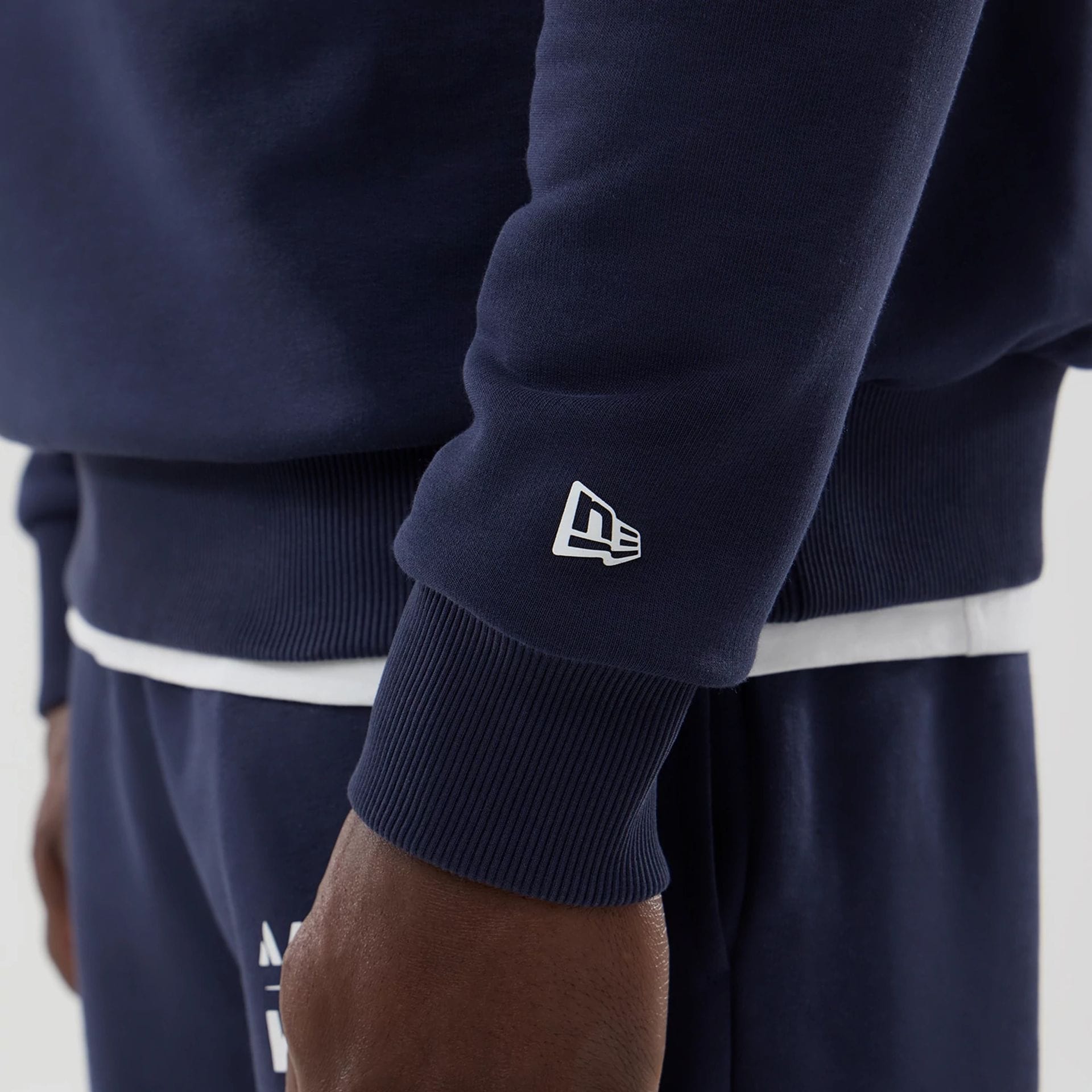 The model is wearing this Atlassian Williams F1 Team Oversized Crew Neck Sweater in navy. 5