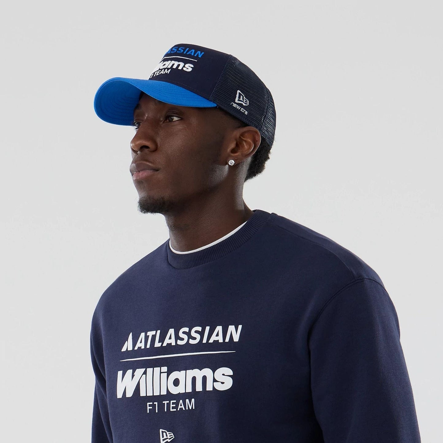 The model is wearing this Atlassian Williams F1 Team Oversized Crew Neck Sweater in navy. 6
