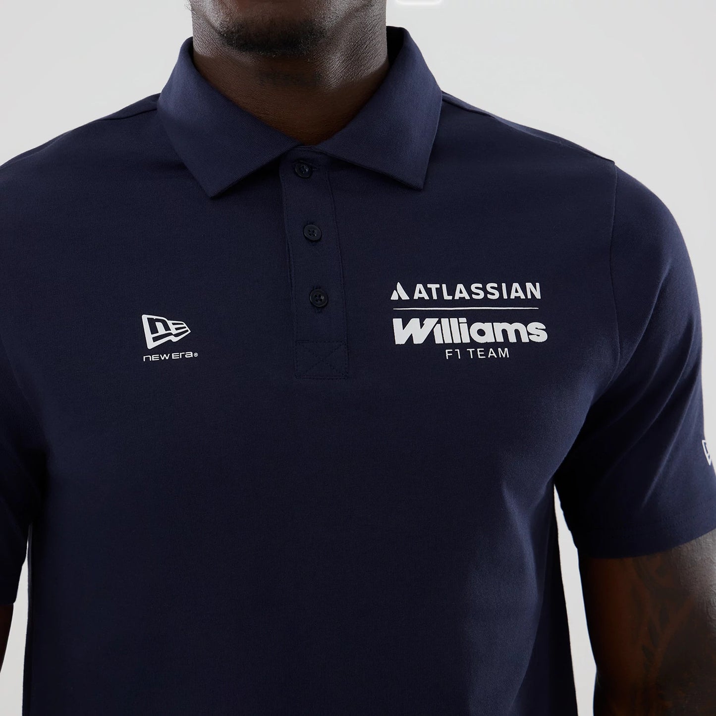 The model is wearing this Atlassian Williams F1 Team Polo T-Shirt in navy. 3