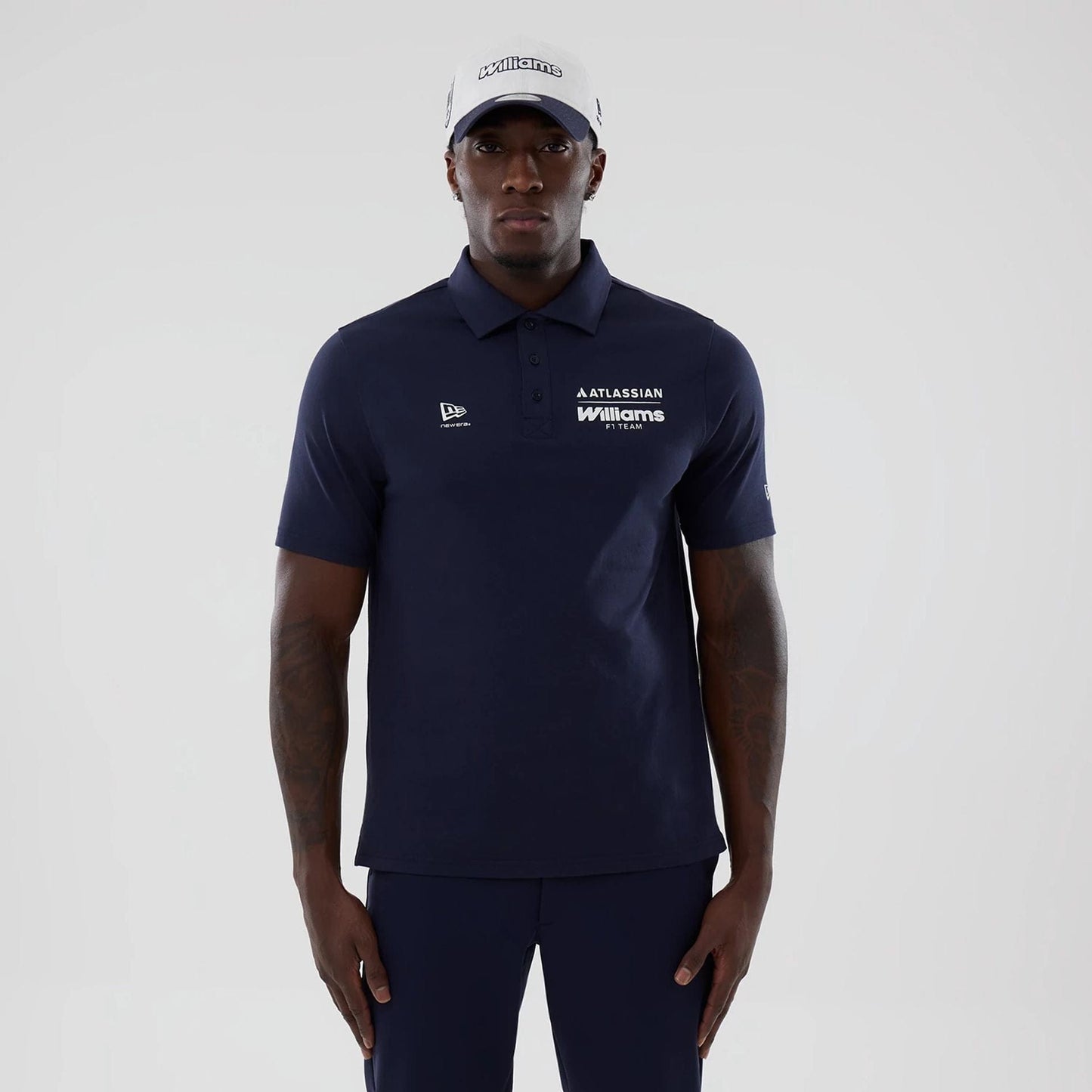The model is wearing this Atlassian Williams F1 Team Polo T-Shirt in navy. 1