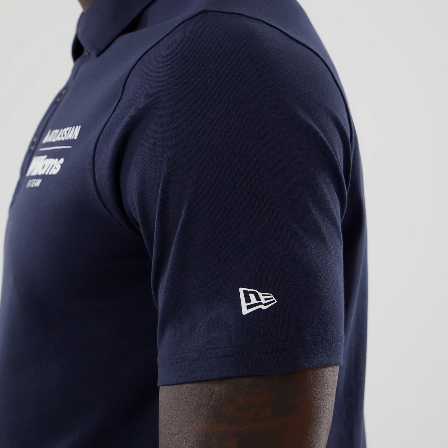 The model is wearing this Atlassian Williams F1 Team Polo T-Shirt in navy. 4