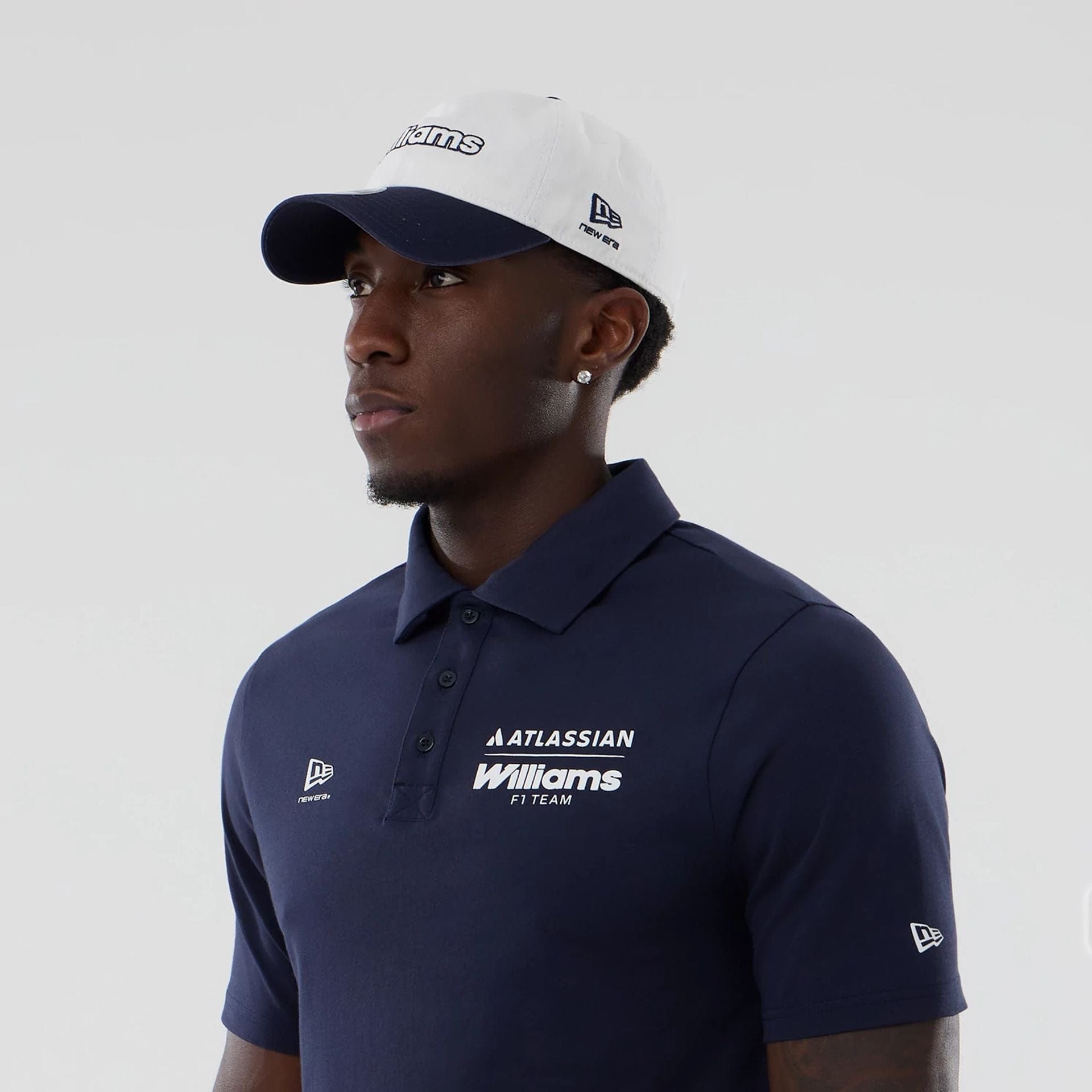 The model is wearing this Atlassian Williams F1 Team Polo T-Shirt in navy. 6