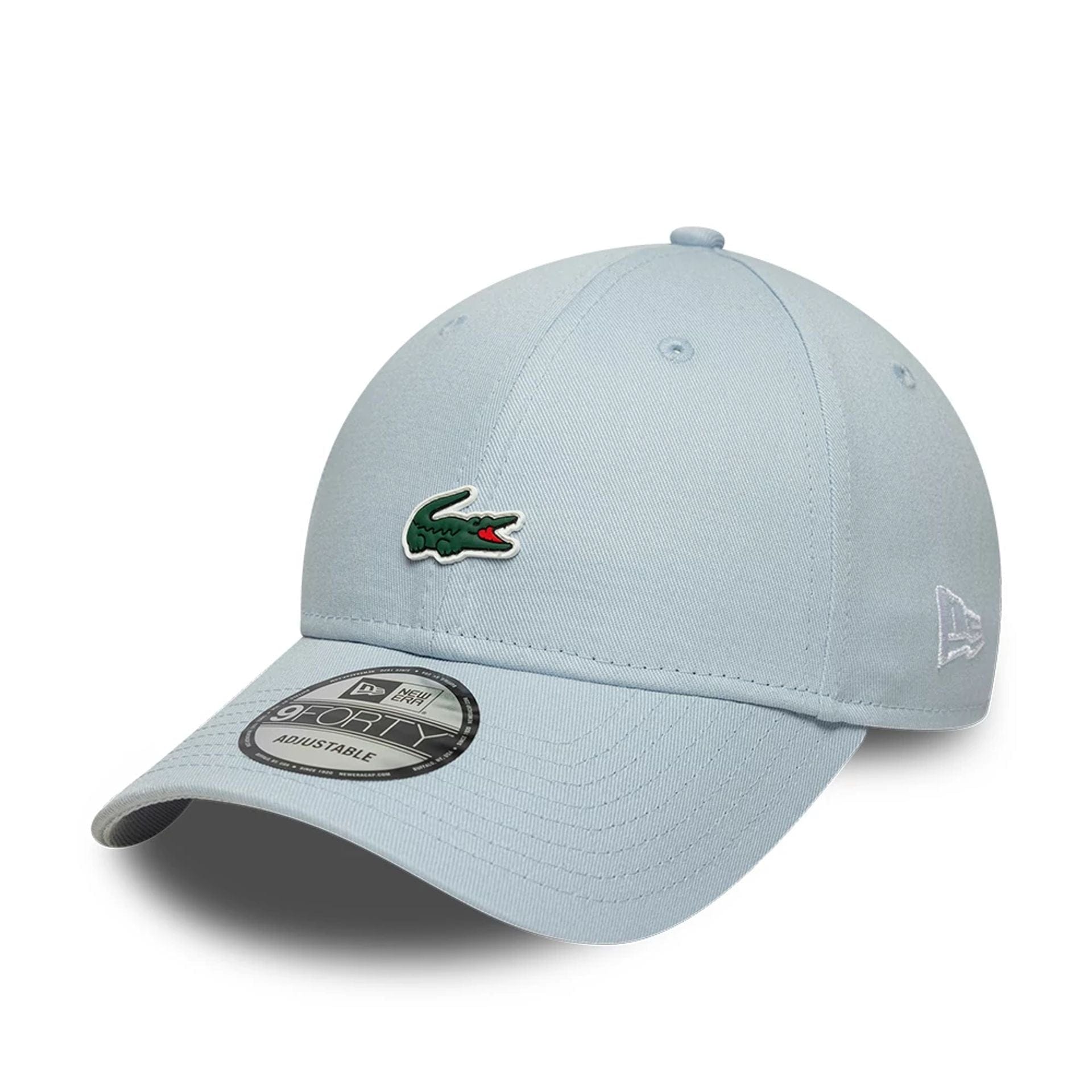 Pictured is this Lacoste X New Era 9FORTY cap in pastel blue. 1