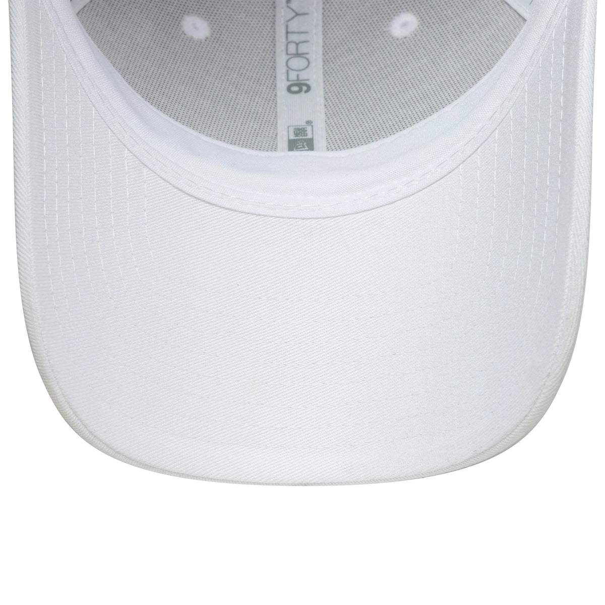 Womens Lacoste X New Era White 9FORTY Adjustable Cap, inside view showing the white undervisor with stitching, the inner taping with a grey 9FORTY logo, and the mesh panel construction, highlighting its structured form.
