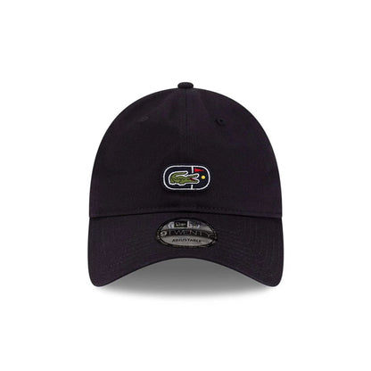 Pictured is this Lacoste X New Era Golf 9TWENTY cap in navy.  4