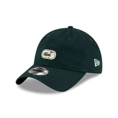 Pictured is this Lacoste X New Era Golf 9TWENTY cap in dark green.  2