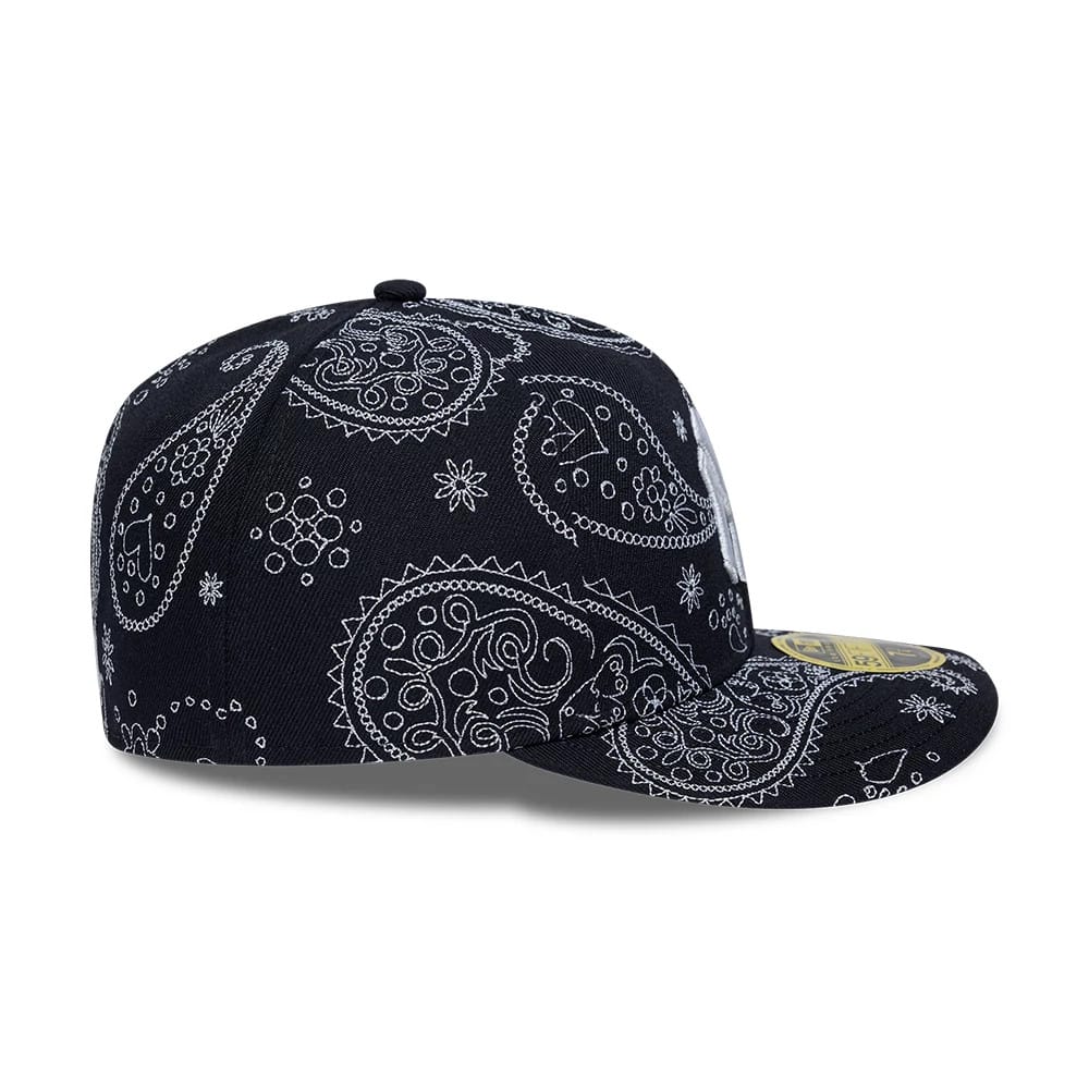 Pictured is this MLB All Over Paisley New York Yankees Low Profile 59FIFTY Fitted cap in navy. 6