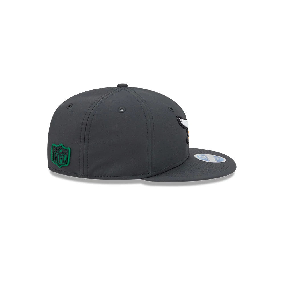 Pictured is this Youth NFL Sideline 2026 Philadelphia Eagles 9FIFTY Snapback cap in charcoal. 7