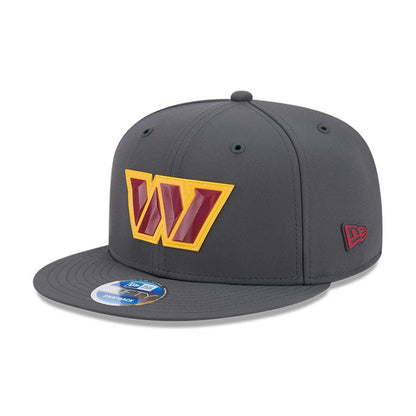 Pictured is this NFL Sideline 2026 Washington Commanders 9FIFTY Snapback cap in charcoal. 1