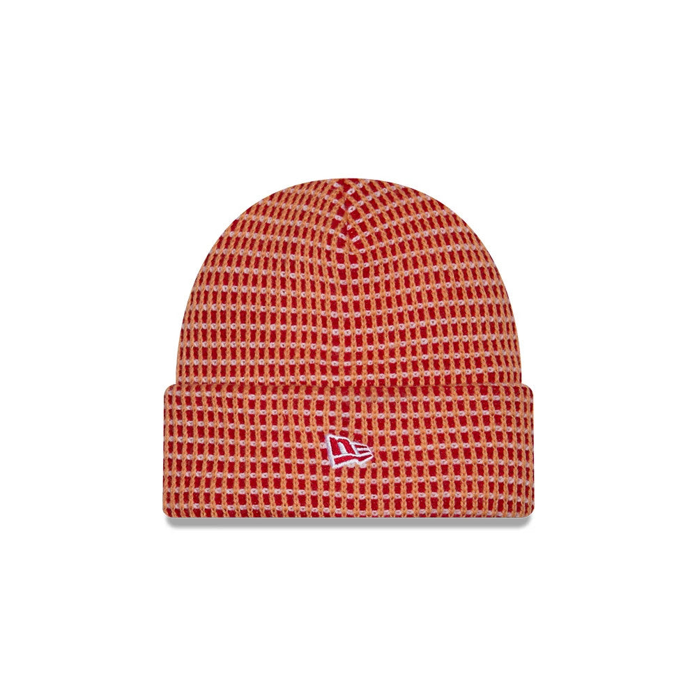 New Era Tampa Bay Buccaneers NFL Sideline 2026 Orange Cuff Knit Beanie Hat, front view showing the embroidered red and white New Era flag logo on the centre of the cuff, with a textured orange and red waffle knit pattern throughout.