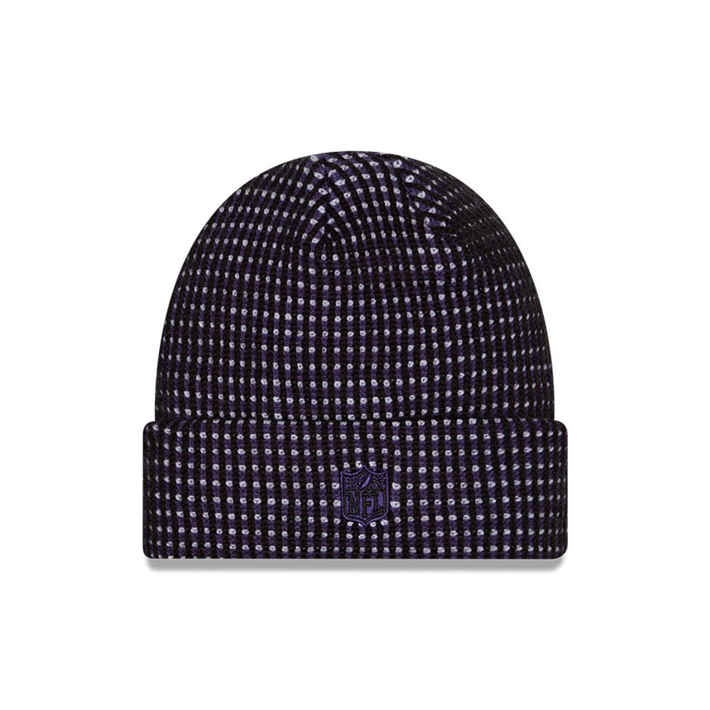 New Era Baltimore Ravens NFL Sideline 2026 Black & Purple Cuff Knit Beanie Hat, front view showing a textured black and purple check pattern on the knitted fabric with a purple embroidered NFL shield logo centred on the cuff.