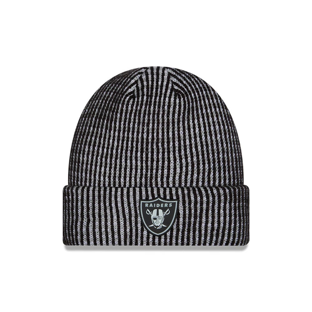 New Era Las Vegas Raiders NFL Sideline 2026 Black & Grey Cuff Knit Beanie Hat, front view showing the black and grey striped pattern, the Raiders shield logo embroidered on the cuff in black and white, and a rounded, cosy fit for warmth.