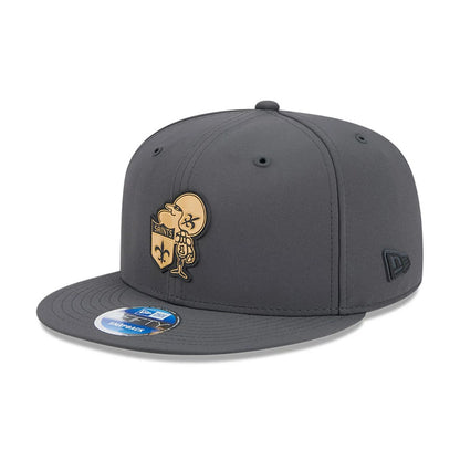 Pictured is this NFL Sideline 2026 New Orleans Saints 9FIFTY Snapback cap in charcoal. 1