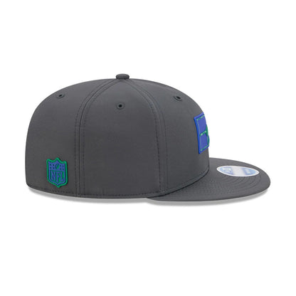 Pictured is this NFL Sideline 2026 Seattle Seahawks 9FIFTY Snapback cap in charcoal. 7