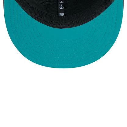 Pictured is this NFL Sideline 2026 Miami Dolphins 9FIFTY Snapback cap in charcoal. 2